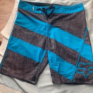 Fox dark gray and teal swim/boardshorts. Ian Walsh signature series. Size 30